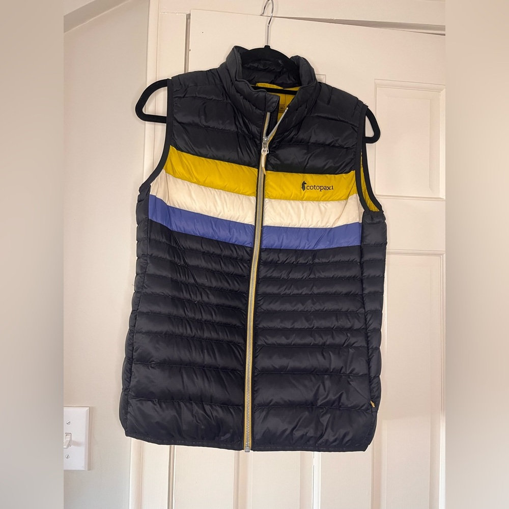 Cotopaxi Quilted Puffer Vest in Dark Navy with Yellow, White & Blue Stripes